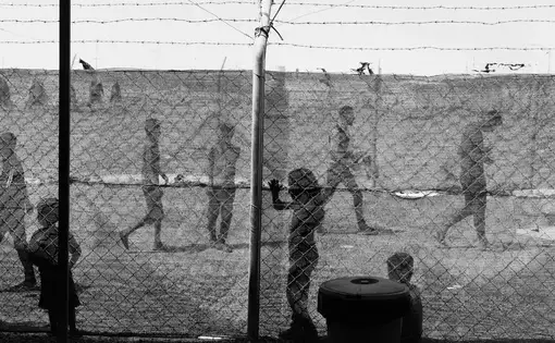 Thousands of men and boys have been convicted of ISIS affiliation, and hundreds have been hanged. But these cases make up only a small fraction of the detainees. Thousands of families have been sent to camps in the desert, cast out from society. Moises Saman / Magnum for The New Yorker. Iraq, 2018.