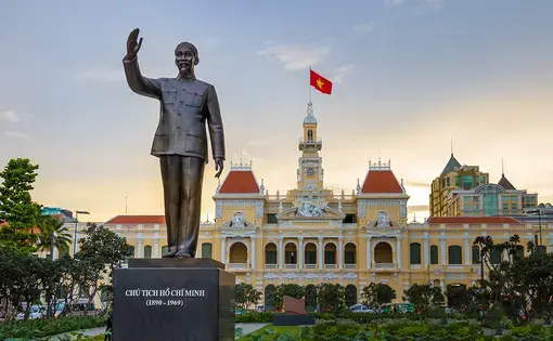 Ho Chi Minh statue in front of City Hall, Saigon, Ho Chi Minh City, Vietnam. Image by Shutterstock. Vietnam, 2018.