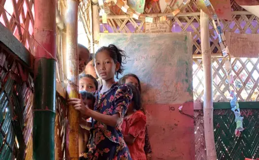 Rohingya girl in doorway