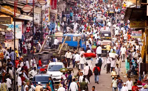 Throngs of people in a city street