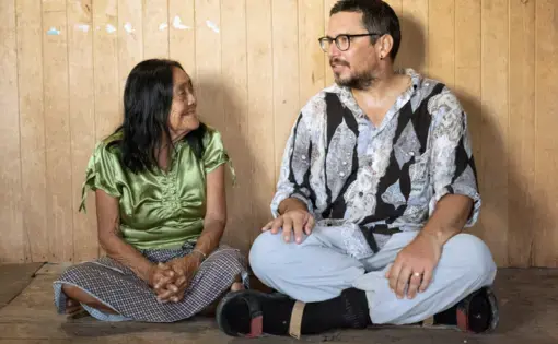 people talk while sitting on the floor