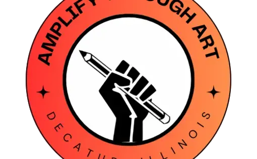 Amplify Through Art Logo - black fist holding a pencil framed by an orange gradient circle with the text "Amplify Through Art, Decatur, Illinois"