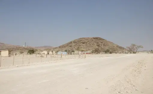 In Namibia’s Kunene Region, livestock farmers are struggling to adapt to the arid conditions brought on by recurring droughts. Sesfontein Constituency, pictured here, is one of the targets of a government-led program whose goal is to assist farmers by distributing goats and rehabilitating a community garden. Mandile Mpofu.