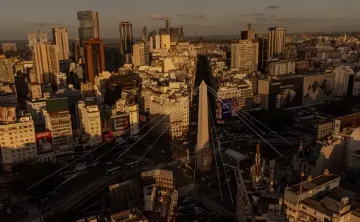 An aerial view of the obelisk in Buenos Aires, with digital lines pointing down from the tip of the obelisk to the ground below.