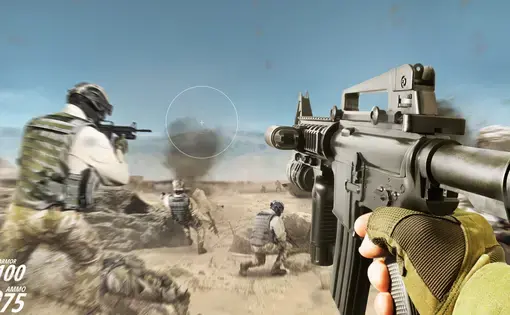 first-person shooter game rifle view with soldiers and explosions. Image by breakermaximus/Shutterstock.