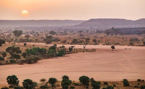 Sunset over the Sahel desert
