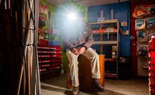 Alejandro, a Detroit construction worker, sits in a hardware store in February 2026. He works in sweltering temperatures and says he's never had training on heat safety. Photo by Alejandro Ugalde Sandoval.