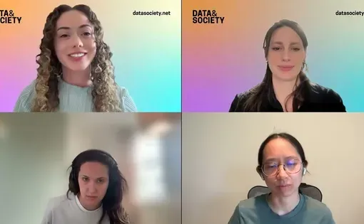 Speakers smile on a webinar screen "Investigating the Impact of Chatbots on Mental Well-Being"
