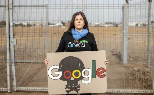 Protester in front of data center construction site