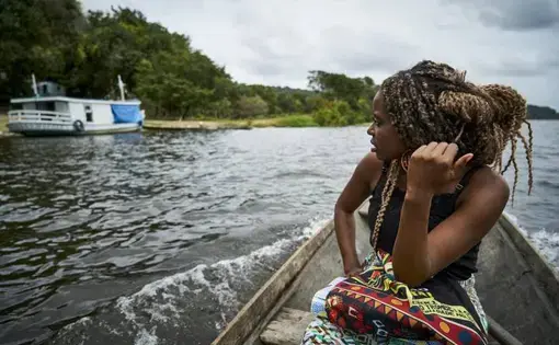 Drica on her way to the community school where she's a teacher. Image by Pablo Albarenga. Brazil, 2019. 