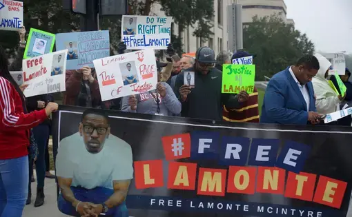 A banner reads #Free Lamonte