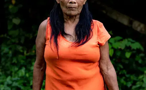 Katicá Karipuna, the matriarch of the Karipuna people, fears the tribe’s lands will be taken from them by force. Image by Sebastián Liste. Brazil, 2019.