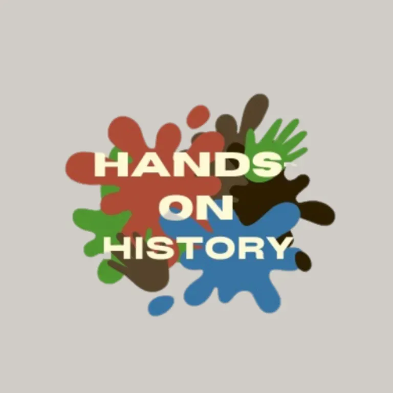John Brown Lives! Hands-On History logo - Hands on History in white text on top of a multi-color paint splatter in the center of a beige background