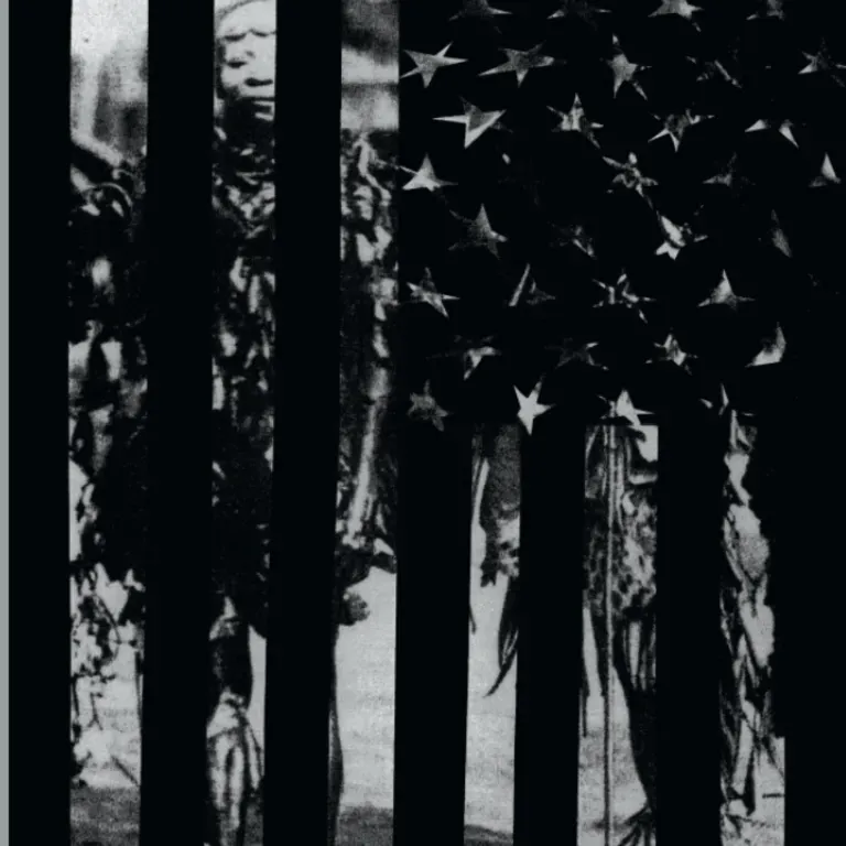 American flag overlayed in a black and white image