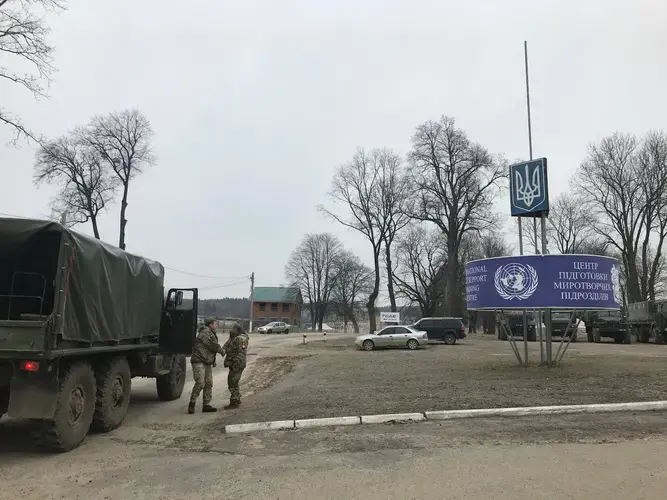 Ukrainian soldiers come to a combat training center in western Ukraine where U.S. and coalition forces are working as mentors. A Wisconsin National Guard unit arrived in November and is scheduled to stay until late summer. Image by Meg Jones / Milwaukee Journal Sentinel. Ukraine, 2020.