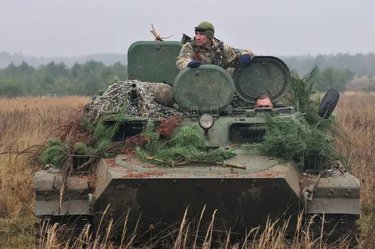 Approximately 160 American soldiers with the 32nd Infantry Brigade Combat Team headquarters company deployed to Ukraine as Task Force Juvigny and assumed responsibility of the Joint Multinational Training Group–Ukraine at the Combat Training Center. Image by Cpl. Jared Saathoff / Wisconsin National Guard Public Affairs. Ukraine, 2020.