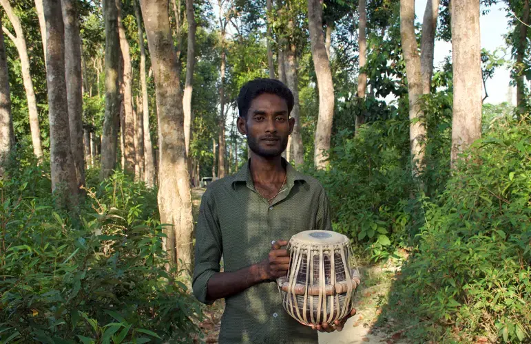 Sayed learned to play the tabla drums on St. Martin's Island, a vacation destination in Bangladesh. Image courtesy Music in Exile. Bangladesh, 2019.&nbsp;