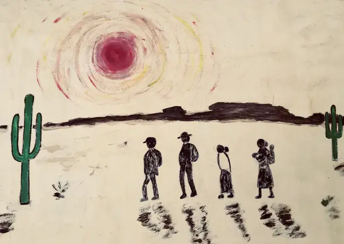 A painting of migrants by Sister Betty Campbell. In the makeshift shrine behind her house in Juárez, she has hung artwork and inscribed thousands of names to commemorate people murdered in Mexico and migrants who died crossing the desert. Image by Lily Moore-Eissenberg. Mexico, 2019.