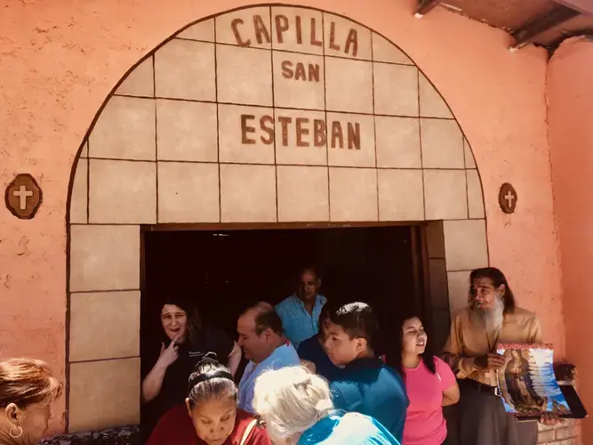 Parishioners gather outside the chapel.&nbsp;Image by Lily Moore-Eissenberg. Mexico, 2019.