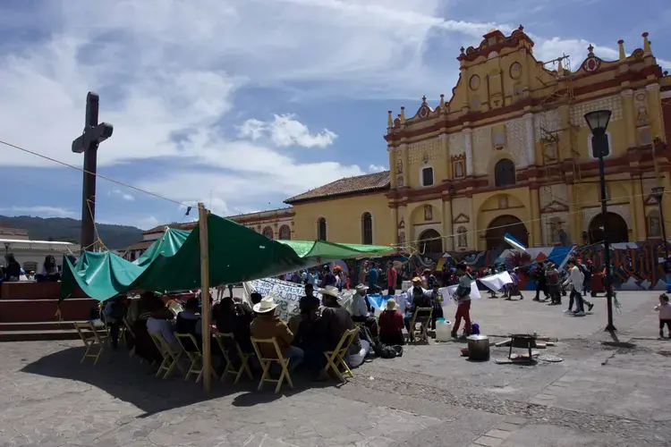 Forced from their village by armed invaders, the people of Nicolas Ruiz have set up camp in the center of San Cristobal de las Casas. They live in a makeshift tarp ill-fitted to protect them from the elements.&nbsp;Image by Jared Olson. Mexico, 2018.