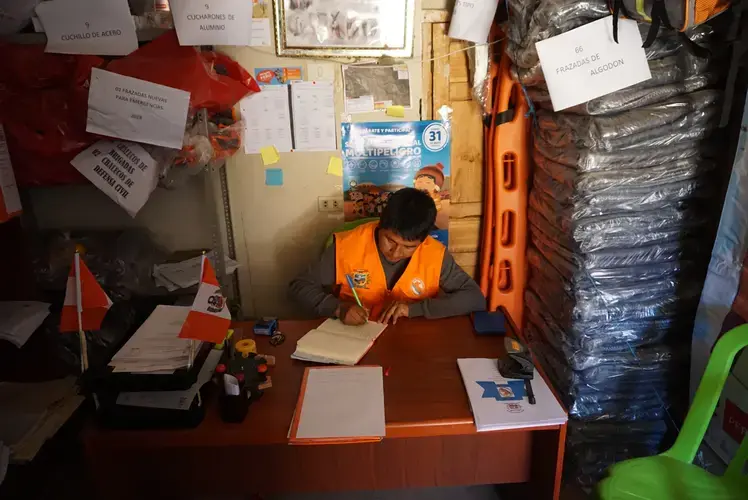 Jorge Almarchaz Paulino in his office.&nbsp;Image by&nbsp;Audrey Fromson. Peru, 2019.&nbsp;