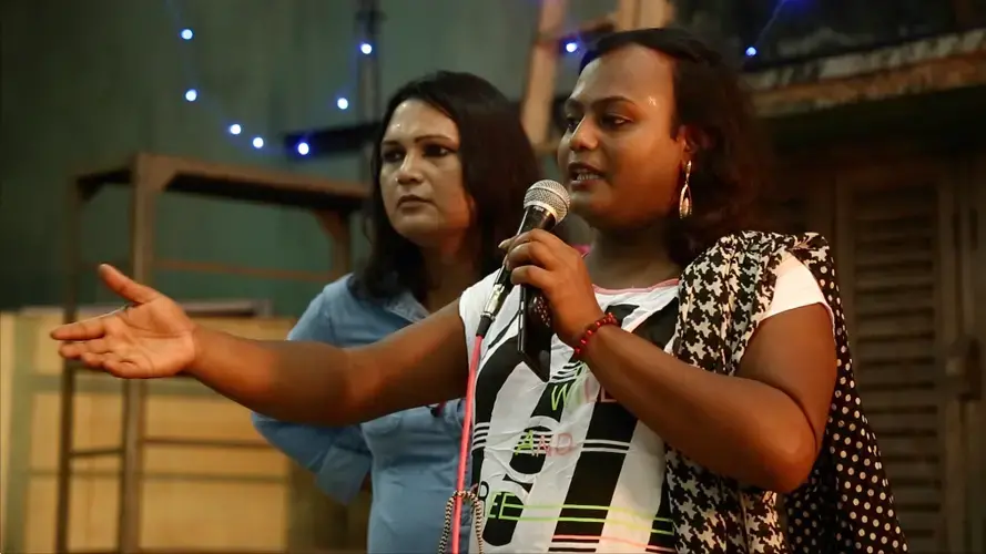 Sintu worked with members of Anandam to organize a queer cafe open to all. As secretary of Anandam, she introduced the event and the evening's performers.&nbsp;Image by Siyona Ravi. India, 2017.