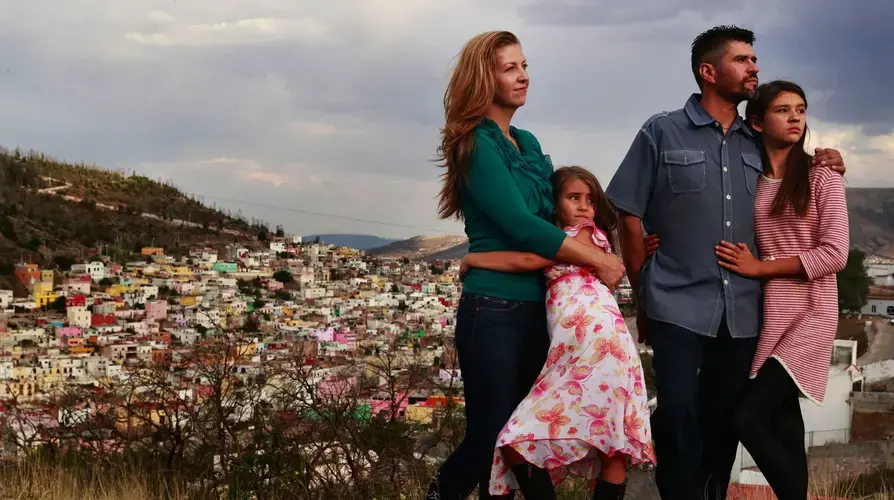 The Valdez family — Joy, daughter Catalina, Rafael and daughter Maya — lives in the city of Zacatecas, Mexico, but hopes eventually to return to the Seattle area. Image by Erika Schultz. Mexico, 2019. 