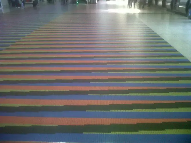 Floor of Couleur Additive&nbsp;in Venzeula's&nbsp;Simón Bolívar International Airportby artist Carlos Cruz-Diez. Image by Lila Franco. Venezuela, 2017.