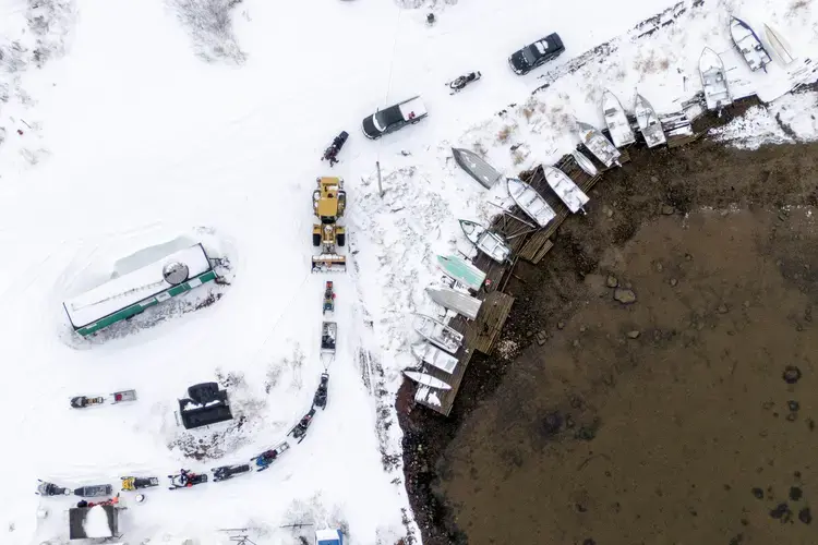 A line for fuel forms at the Rigolet gas station on November 14, 2019. Fuel comes twice a year by tanker ship and the gas station is open every other day for about two hours. Image by&nbsp;Michael G. Seamans. Canada, 2019.