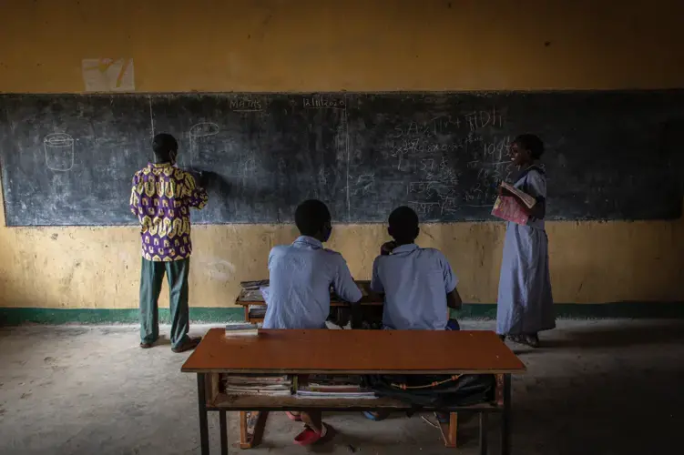 Edward Lekapana, left, teaches at a school in Laisamis, Kenya. “Some come back. They don’t concentrate the way they were concentrating before. There are some who are married off. Those who are do not return to school after they're married,” he said.&nbsp;Image by Will Swanson. Kenya, 2020.