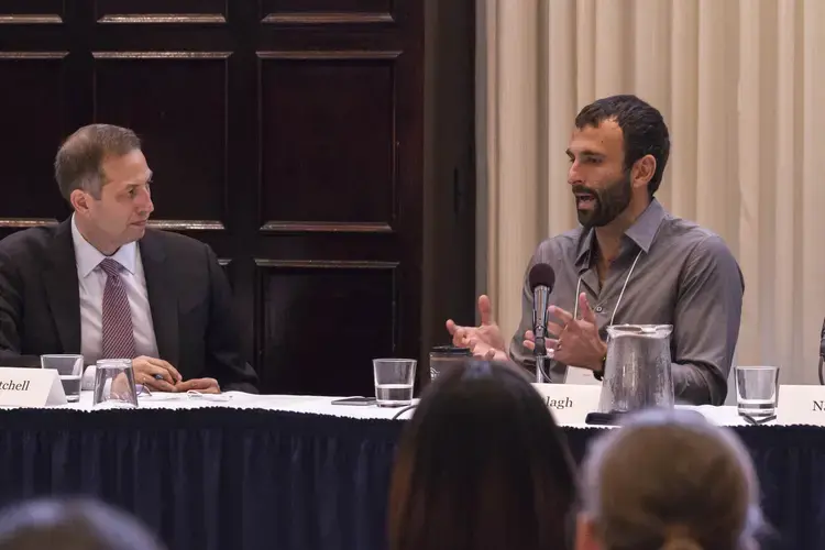 At left, Ambassador to Burma Derek Mitchell listens to journalist Jason Motlagh speak about his upcoming documentary about the Rohingya. Image by Jin Ding. Washington, D.C., 2018.