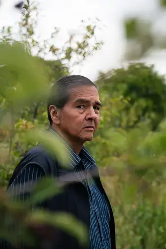 George Horse Capture Jr. is a member of the Aaniiih Tribe. 'To me [buffalo] are a symbol of strength, endurance and the failure — the absolute failure — to go the way of the dodo bird,' he says. 'They were teetering, but now they're back.' Image by Claire Harbage / NPR. United States, 2019.