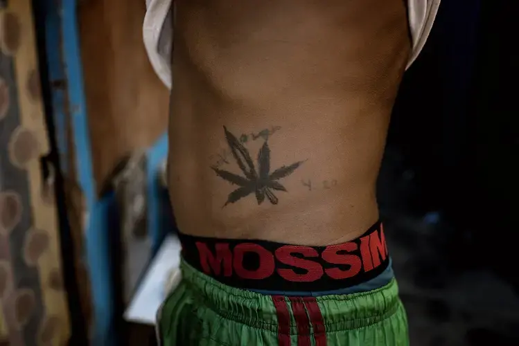 Since Duterte took office, this tattoo has changed from a whimsical expression of irreverence to something that might draw uncomfortable attention. Image by James Whitlow Delano. Philippines, 2017.