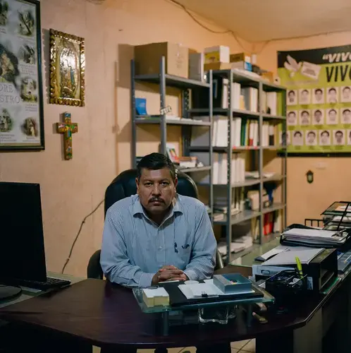 Raymundo Ramos Vázquez, the director of the Human Rights Committee of Nuevo Laredo, inside of his office.&nbsp;Image by by Christopher Lee. Mexico, 2020.