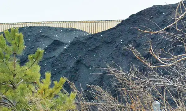 Residents of Chicago’s Southeast Side hope to replace piles of petroleum coke with people-friendly redevelopment. Image by U.S. Environmental Protection Agency.&nbsp;