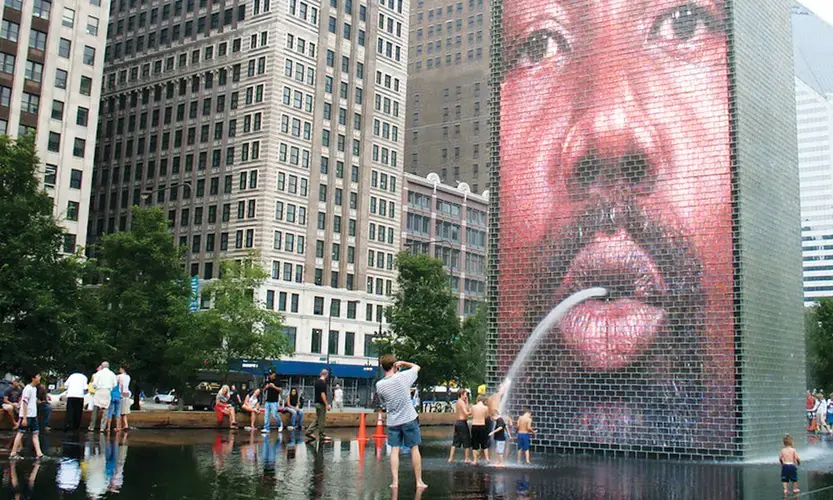 The Crown Fountain in Chicago’s Millennium Park offers welcome relief to heat-stressed residents. Image by&nbsp;Jaume Plensa / Flickr. United States, undated.