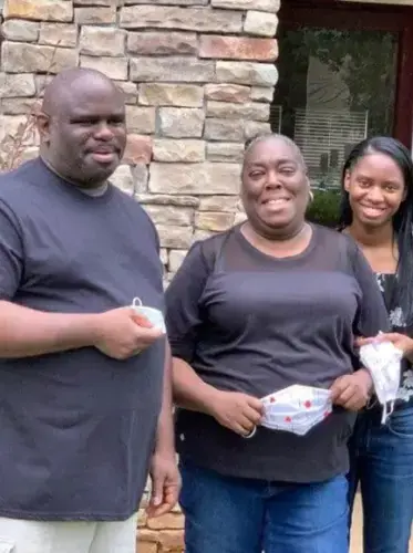 Traci Evans Simmons with her husband Bruce, and daughter, Brielle. Image by Melba Newsome. United States, 2020.