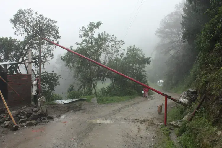 Community members that oppose of the mine see the barrier as a form of resistance, those who support the mine see it as a violation of their rights to free movement. Image by Andrés Bermúdez Liévano. Ecuador, 2019.