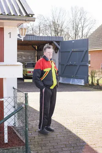 Reinhard Schlemmer, a retired East German army officer and Sumte's former mayor, set in motion the plan to relocate nearly 1,000 refugees to an under-used office complex in his small village. 'All the children out in the dirt,' he remembers thinking. 'And all of our halls standing empty.' Image by Valerie Schmidt. Germany, 2017.