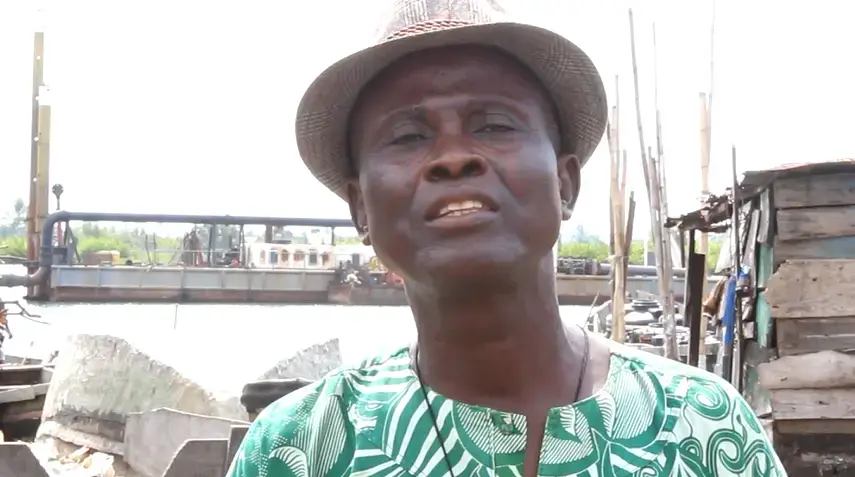 Ujemeji Thomas, a fisherman, says dredging machines have chased fish from the Lagoon in Bishop Kodji Island. Image by Bukola Adebayo. Nigeria, 2017.