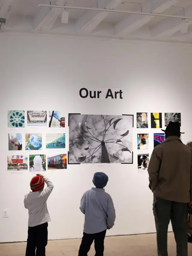 People standing in front of the Everyday DC gallery