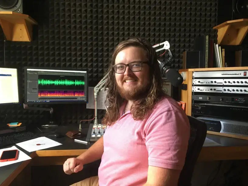 Eric Stone sitting at desk
