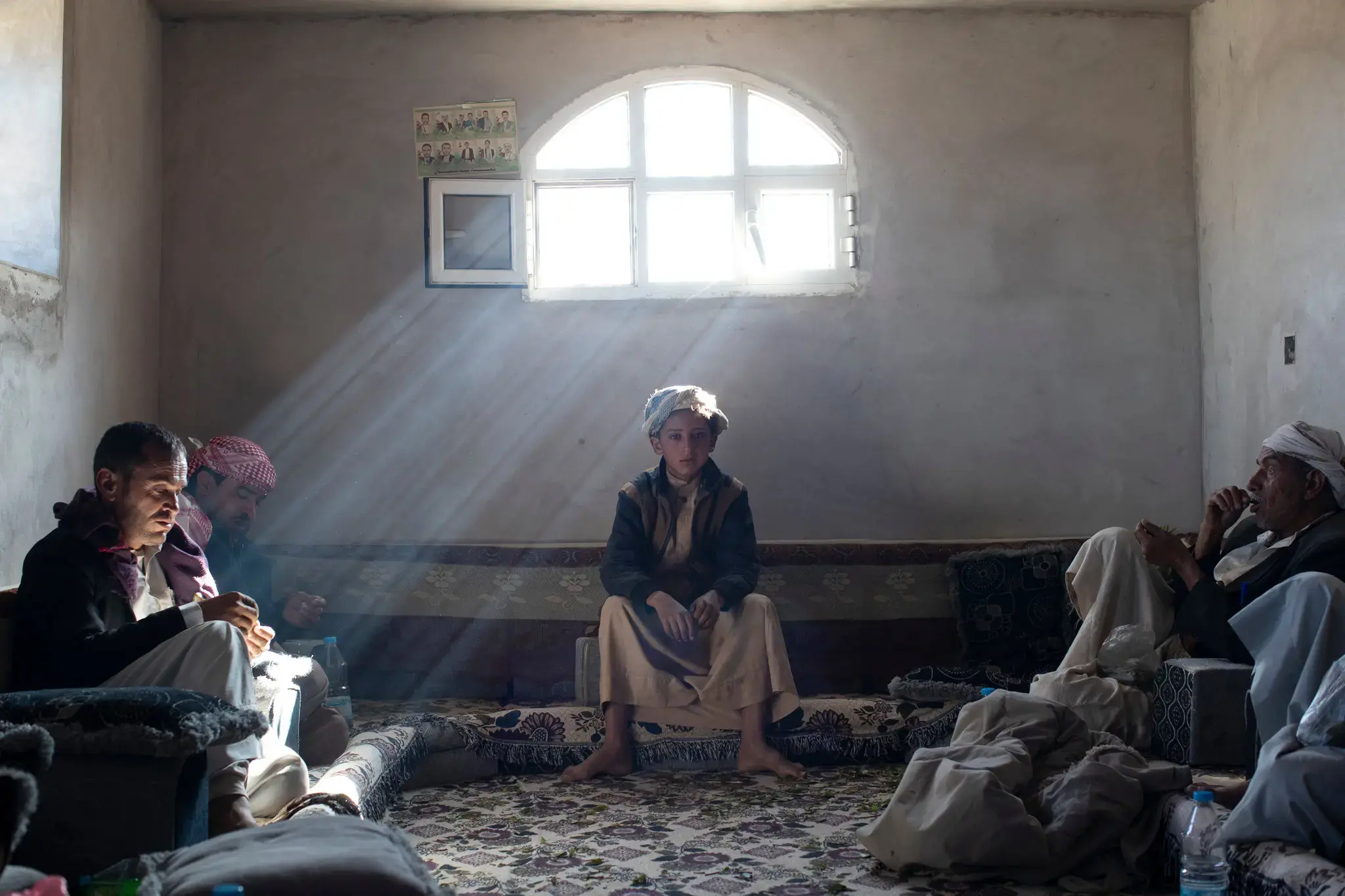 Abdullah Abed al-Abdeli, age 12, whose father died in an airstrike in Northern Yemen. Image by Tyler Hicks/The New York Times. Yemen. 2018.