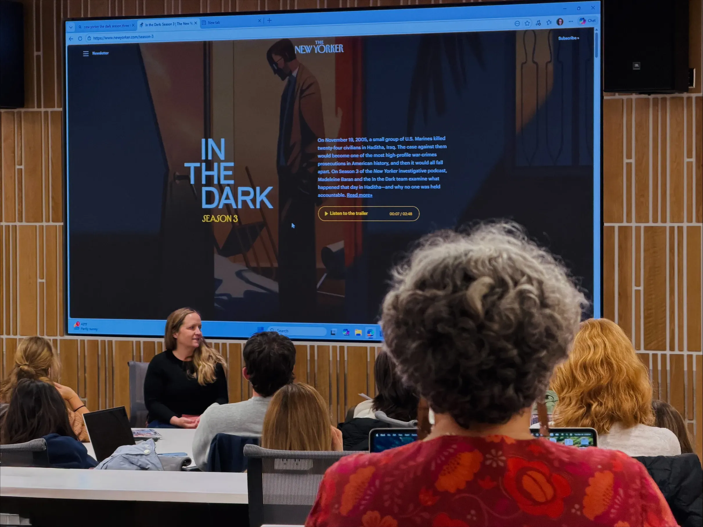 students listen to a visiting journalist lecture