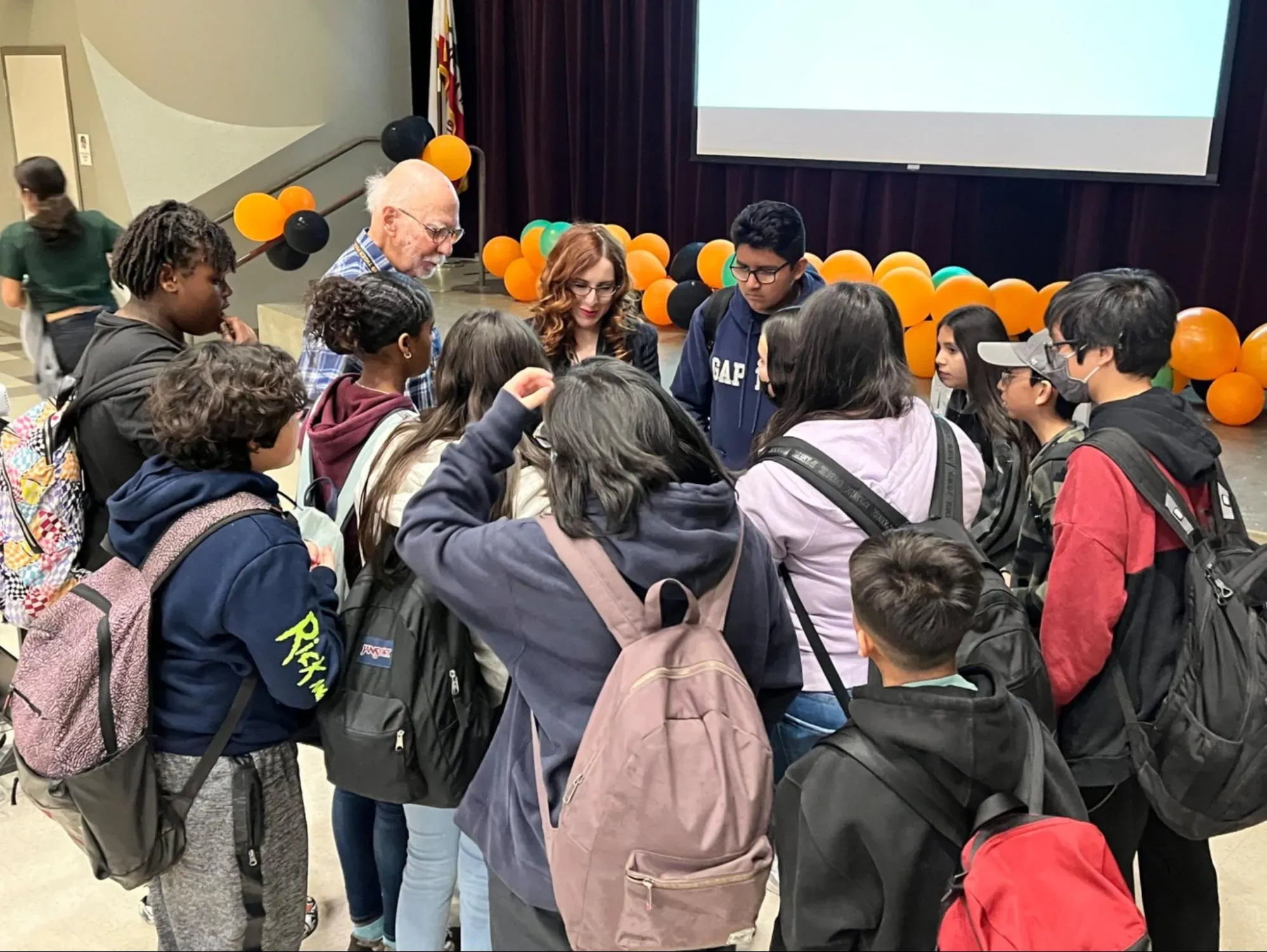 Students in a group talking