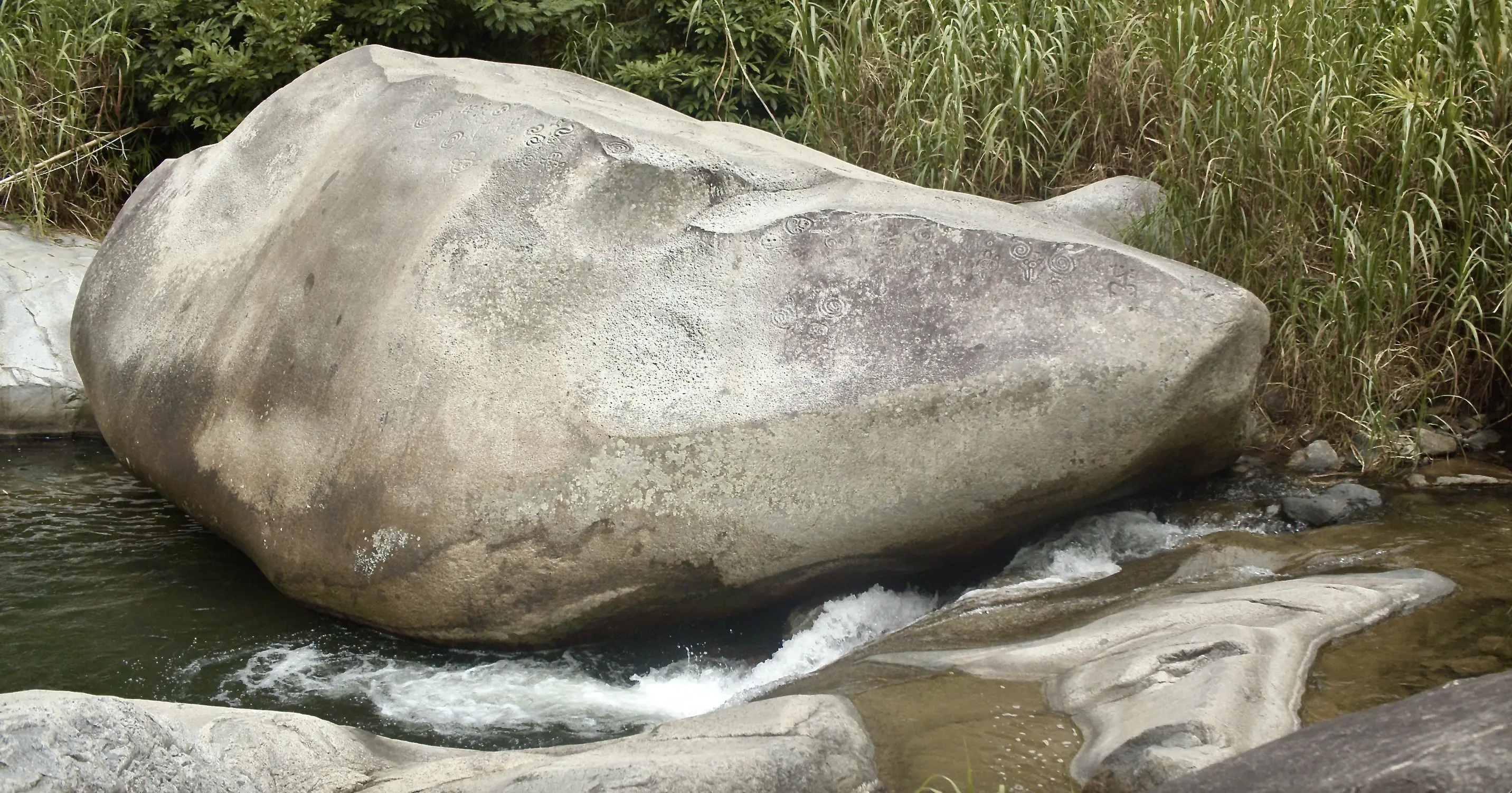 large rock in river