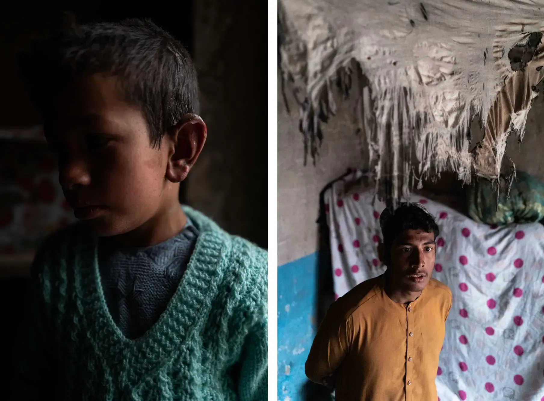 A boy in a sweater and a guy stands in a area