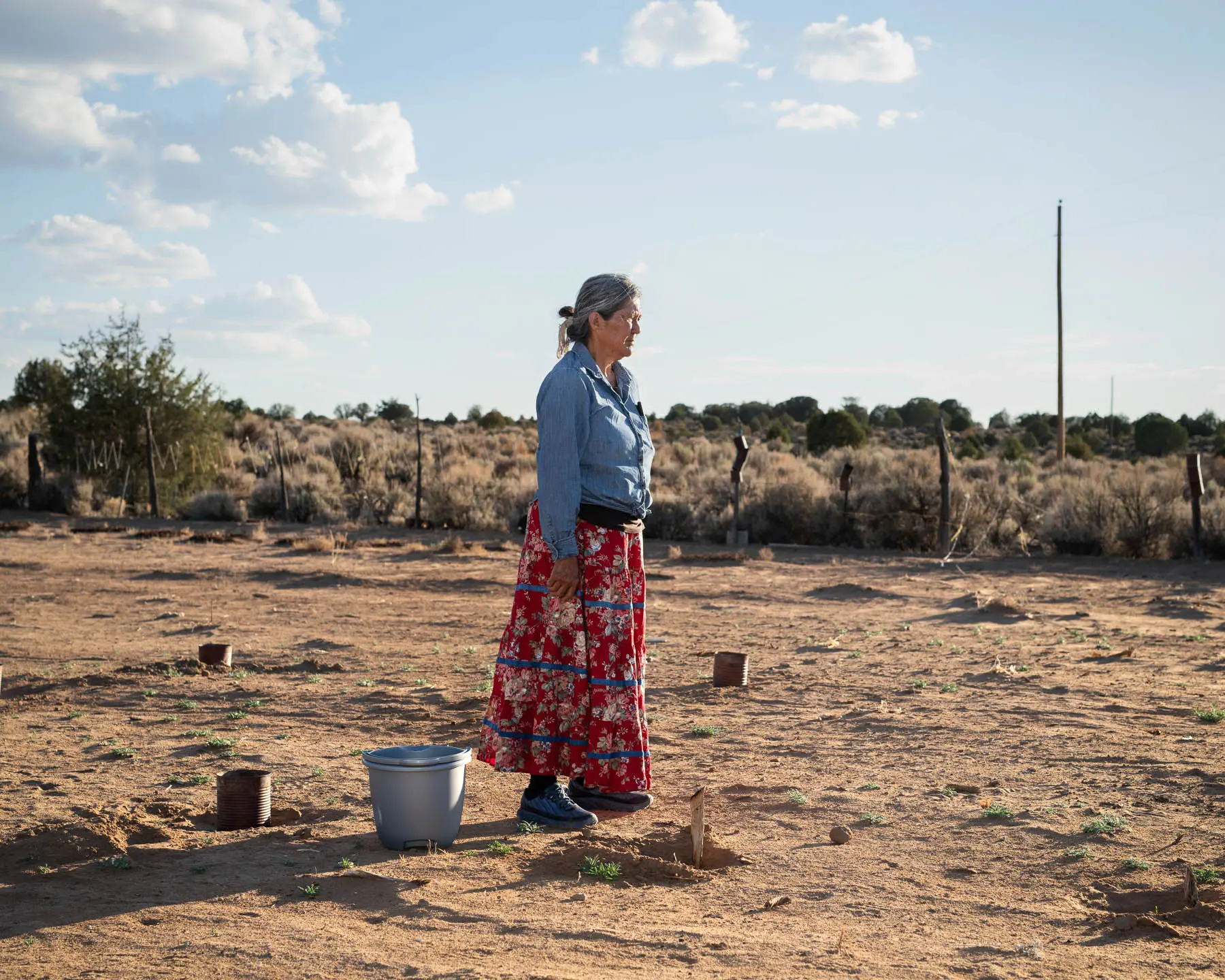 Woman stands in the dessert