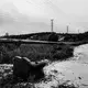 ENVIRONMENTAL RISK. An abandoned sofa sits near the oil pipeline in Kandis. Miles of crude oil and gas pipeline and hectares of palm trees run alongside a road in Kandis, Riau, Indonesia on June 27, 2018. Image by Xyza Cruz Bacani.