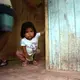 Another one of Karina's nieces, Gabriela, at the entrance to the family's kitchen in Pucallpa.&nbsp;Image by Natalie Hutchison. Peru, 2017.